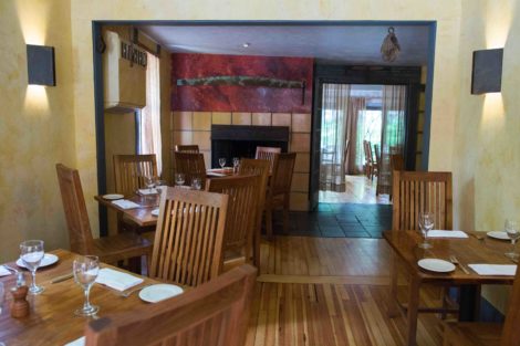 The John Andrews dining room, characterizing the restaurant's elegant farmhouse ambience.