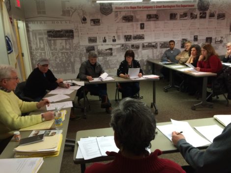 Historical Commission ponders proposal from Chrystal Mahida, seated at table before the Commission: from left, Vijay Mahida, David Carpenter (director of operations for Mahida family interests), Chrystal Mahida, and attorney Kate McCormick.