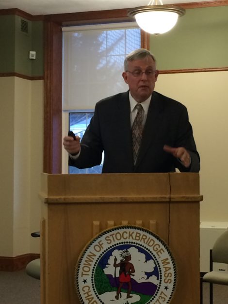 Stephen Hemman from the Massachusetts Association of Regional Schools speaks to a packed house in the Stockbridge Selectmen’s meeting room last November.
