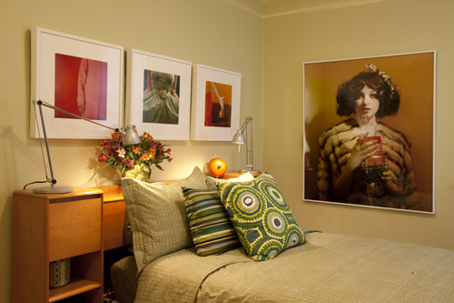 Bedroom with art.