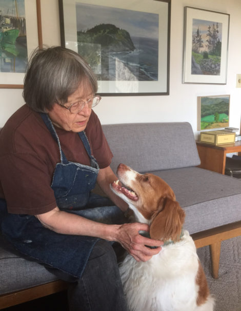 Eunice Agar in her studio, with her Brittany spaniel Hicks.