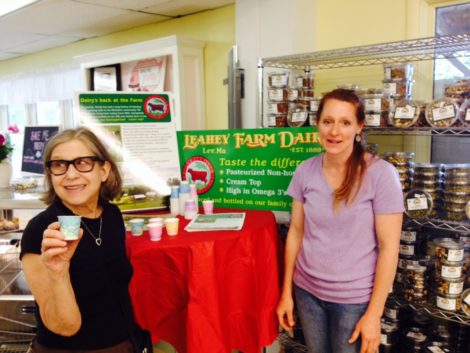 Jen Leahey, right, of Leahey Farm at Berkshire Organics open house. Susan Geller of Pittsfield is sampling the milk.