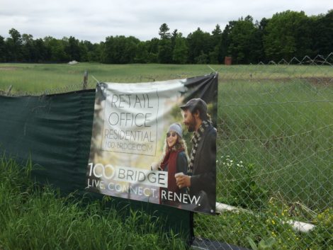 The 100 Bridge Street property remains fallow for the moment, awaiting DEP permission to resume remediation of carcinogenic dioxins and PCPs.