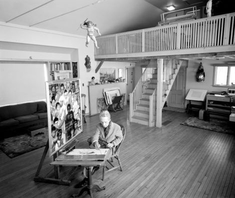 Norman Rockwell working on Golden Rule in his South Street, Stockbridge, Massachusetts, studio, 1960. Photo by Bill Scovill