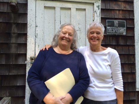 Mary-King Austin and Cory Hines, program presenters, greeted Heritage Walk participants at the schoolhouse door.
