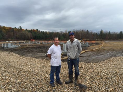 Berkshire Hills Regional School District facilities manager Rick Soule, left, and solar energy entrepreneur Kirt Maryland at the Solar 1 site in Housatonic.