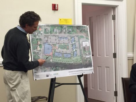 At a Planning Board meeting CDC Executive Director Tim Geller explains the features of the 100 Bridge Street development.