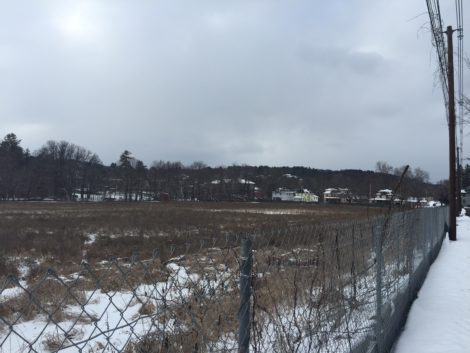 The 100 Bridge Street (former Log Homes) site currently lies fallow, awaiting environmental remediation and development. Photo: Heather Bellow