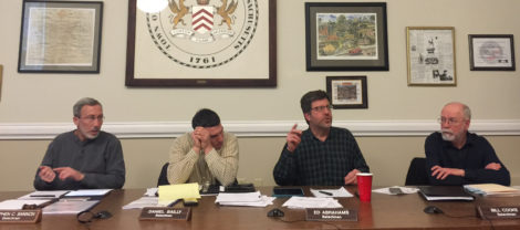 Selectboard member Ed Abrahams, gesturing, expressed concern that the affordable housing units would be situated near the adjacent sewage treatment plant, as fellow board members listed. From left, Stephen Bannon, Dan Bailly and Bill Cooke. Photo: Heather Bellow