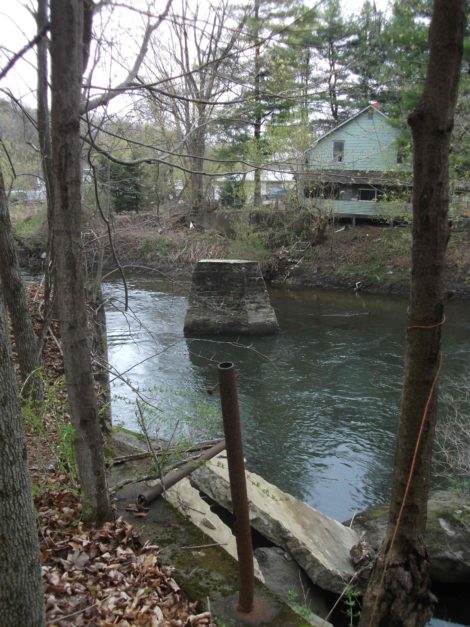 Only a pier remains of D.D. Hopkins’ private bridge over the Housatonic River at Stockbridge Industrial Park. (Bernard Drew photo)