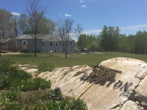 The rock that held the Eagleton school iconic Eagle sculpture is now barren. The Eagle is gone. Photo: Heather Bellow