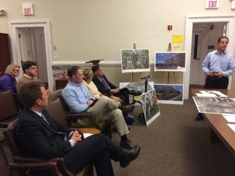 Benchmark Develpment’s Michael Charles, standing, speaks to the Historic District Commission about how he will screen Searles Castle from a new development off Bridge Street. Seated, front row from left: Benchmark attorney Nicholas Arienti, John Dewey Academy Facilities Manager Robert Gaughran, Searles owner Carole Bratter. St. James Place developer Sally Harris, left, and Berkshire Co-op Market board president Dan Seitz, in second row. Photo: Heather Bellow