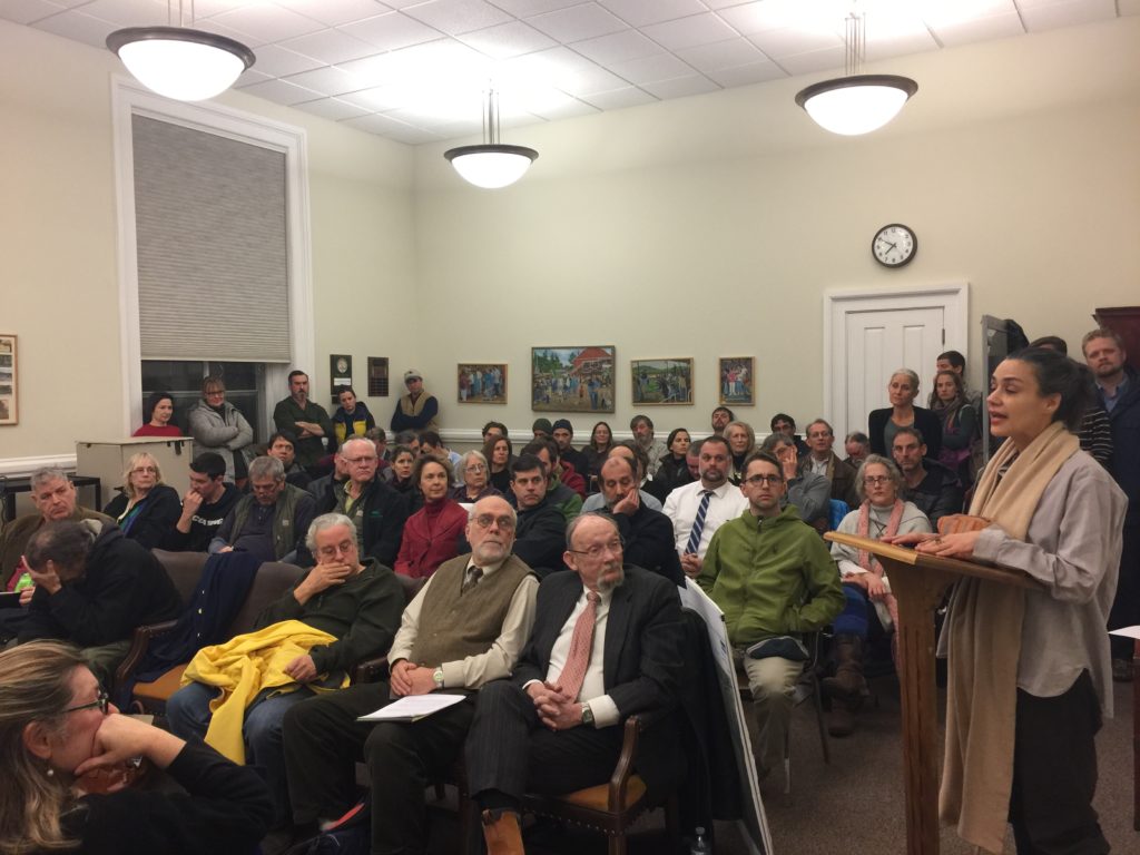 A packed Zoning Board of Appeals meeting Wednesday, at which more people listened from the hallway as a resident spoke of her concern about the impact of large commercial solar projects in residential/agricultural areas. Photo: Heather Bellow