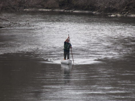 On his canoe trek across the state on behalf of decontaminating the Housatonic River Denny Alsop approaches the Bridge Street bridge in Great Barrington. Photo: Isaac Scribner