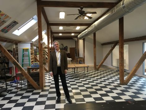 Paul Lindenmaier shows a visitor the new art studio that overlooks the Learning Commons.