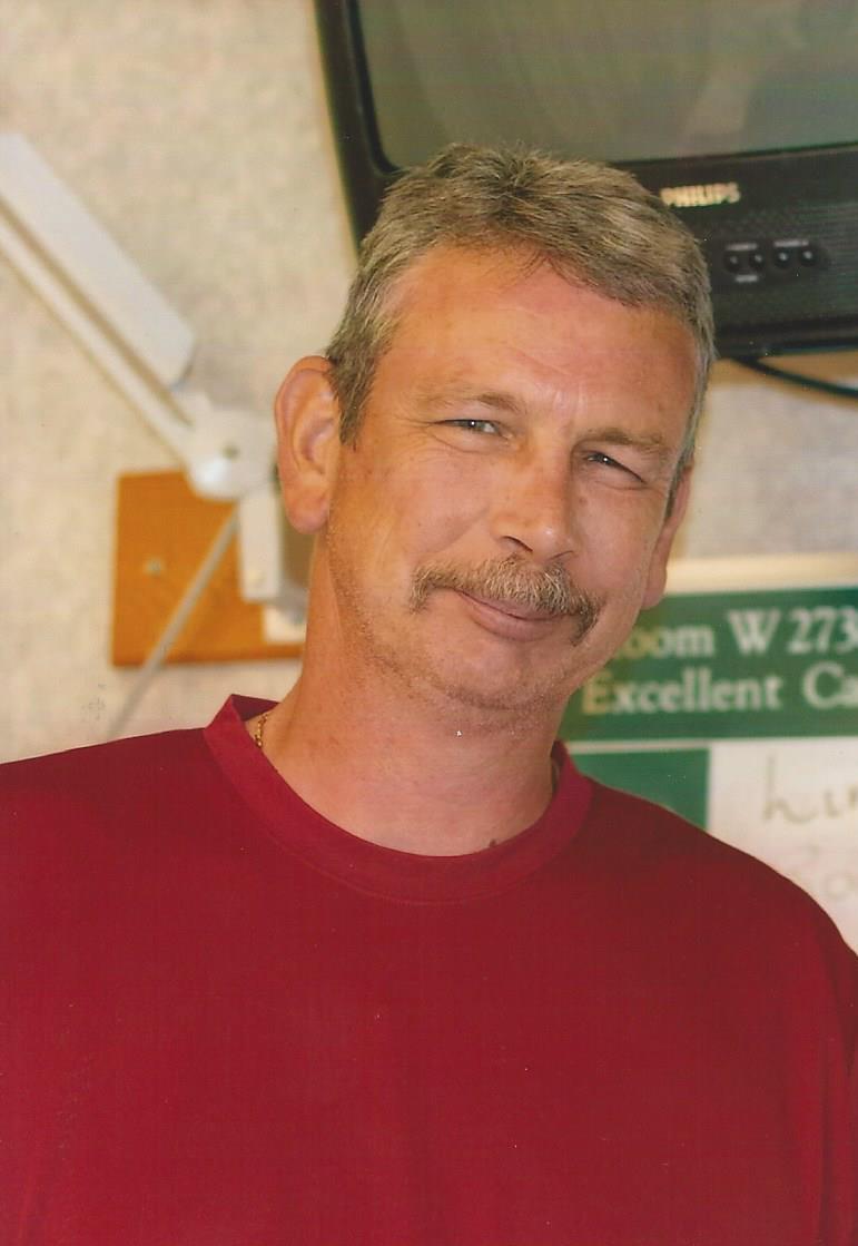 Michael F. 'Mike' Sawyer, 54, of Becket, town police officer and