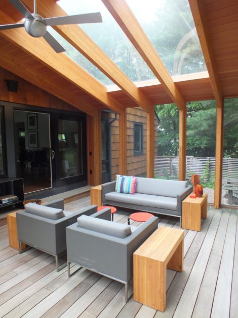 Interior view looking toward house; sliding doors allow direct access between screen porch and interior living areas. - Photo: Michael Alper