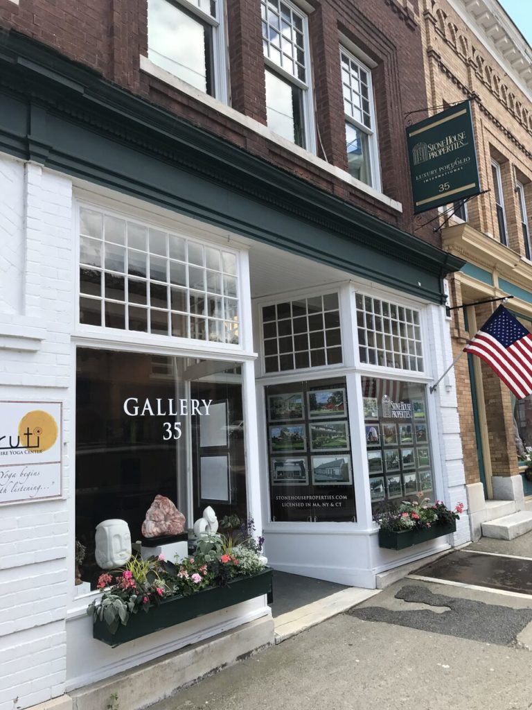 Stone House Properties on Railroad Street complements its real estate office with an art gallery. Photo: Terry Cowgill