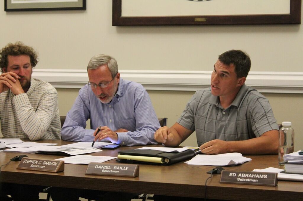 Selectman Dan Bailly suggests there could be other reasons for lead levels detected by airport neighbors. At left are selectmen Sean Stanton and Steve Bannon. Photo: Terry Cowgill