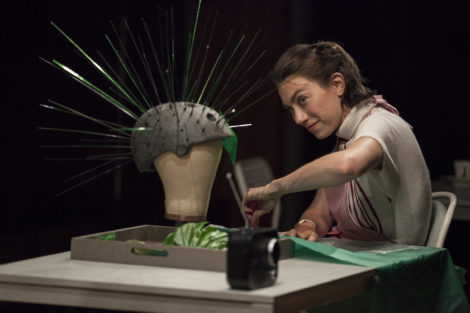 Madeline Wise as Joan, creating a headdress. Photo: Maria Baranova