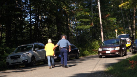 State Police lead away a protester. Photo: Ben Hillman